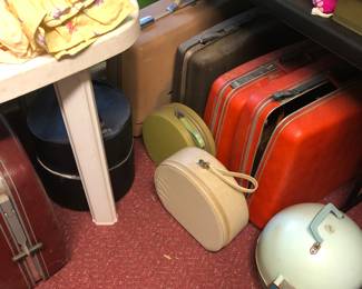 Hat box, hair dryers in zip cases, hair dryer in hard case, luggage, etc.