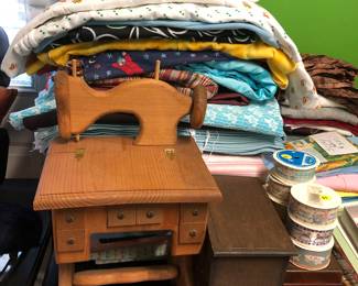 Wood handmade sewing machine with storage, fabric, ribbons, etc.