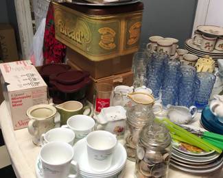 Bread box, dishes, glasses, sugar and creamers, hand mixers, silverware 