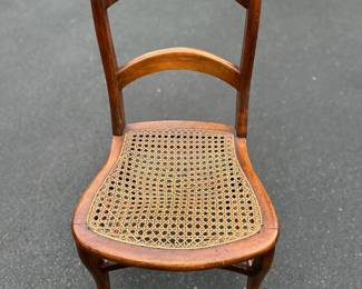 Antique mahogany cane chair