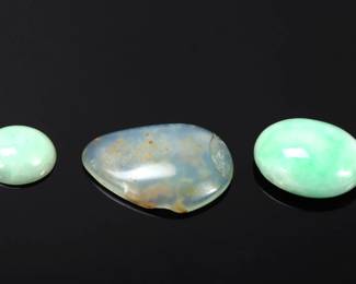 Lot 185 Group of Three Chinese Hardstone Pendants