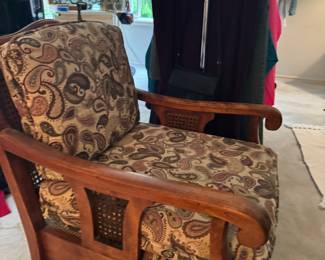 Traditional Wooden Armchair with Cane Accents and  Paisley Cushions
