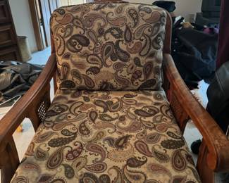 Traditional Wooden Armchair with Cane Accents and  Paisley Cushions
