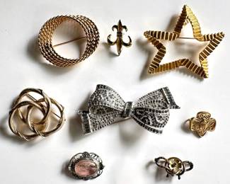 8 Vintage Pins Brooches By Monet, Vans & More
Lot #: 68