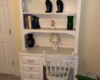 White, modern style bookshelf with drawers