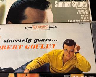 Vintage Vinyl Record Lot featuring albums from artists including Benny Goodman, Ray Conniff, Robert Goulet, and Ella Fitzgerald. Includes titles such as 'Victory at Sea', 'Memories Are Made Of This', and 'Sincerely, Robert Goulet'. Perfect for collectors and music enthusiasts. See pictures for more details.