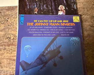 A collection of classic vinyl records featuring artists such as Buddy Holly, Andy Williams, Frank Sinatra, and others. Includes albums like 'Lonely Street' and 'Latin Affair.' Perfect for collectors and music enthusiasts. See pictures for details.