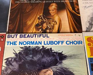 Vintage Vinyl Record Lot featuring albums from artists including Benny Goodman, Ray Conniff, Robert Goulet, and Ella Fitzgerald. Includes titles such as 'Victory at Sea', 'Memories Are Made Of This', and 'Sincerely, Robert Goulet'. Perfect for collectors and music enthusiasts. See pictures for more details.
