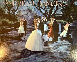 Vintage vinyl record collection featuring artists like Spinners, Duke Ellington, Glenn Miller, and others. Includes titles such as 'Used to Be Duke,' 'The Roaring 20's,' 'Coffee Break,' and 'Dream Dancing.' See pictures for more details.