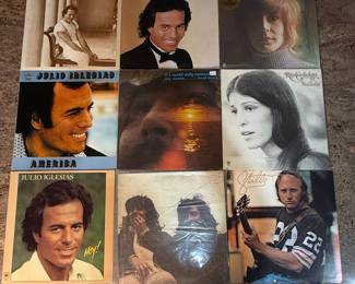 Julio Iglesias Vinyl Record Collection featuring nine albums including titles such as 'America', 'Hey!', and 'A World of Love'. Various years of release, showcasing classic Latin pop music. See pictures for more details.
Please check photos for condition and any condition issues. We have verified the contents and looked for major scratches. This is a well loved collection and should be accepted as such.