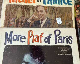 Includes a collection of vintage vinyl records from the 1960s and 1970s, featuring genres such as folk, world music, and educational records. Notable titles include 'Modern Spanish,' 'Hilo Hawaiians Honeymoon in Hawai'i,' and 'Here's Tae Bonnie.' See pictures for more details.