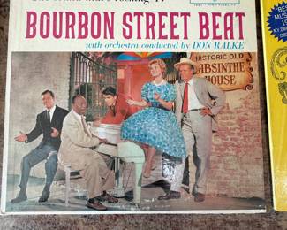 Lot of 15 vintage vinyl records including classics like 'The Mikado', 'Black Orpheus', and 'Godspell'. Various artists and genres spanning the 1960s to 1970s. Notable brands include Philips and Capitol Records.
A diverse collection of vintage vinyl records featuring titles such as 'The Mikado', 'Black Orpheus', and 'Bourbon Street Beat'. Explore the rich sounds of musical history.
