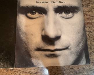 Vinyl Records Lot - Includes albums from various artists like Bryan Ferry and Morrissey. See pictures for details on specific titles and conditions.