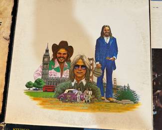 This auction lot features a selection of vintage vinyl records, including titles such as 'Country Gold', 'Wanted! The Outlaws', Johnny Cash, and more. A great addition for music lovers and collectors alike. See pictures for more details.