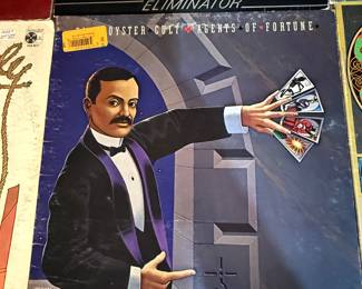 Lot of 9 vinyl records featuring various artists including Commander Cody, Joe Walsh, Blue Oyster Cult and L.T.D. Records from the 1970s. See images for details.