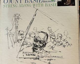 Vinyl Record Album collection featuring classic jazz albums from the Dave Brubeck Quartet, Duke Ellington, George Benson, and more. Includes titles like 'Count Basie', 'One Stormy Night', and 'Under Skies of Paris'. Perfect for collectors and jazz enthusiasts.