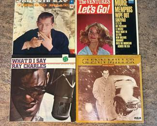 Vintage Vinyl Record Lot featuring Johnnie Ray's 'The Big Beat', The Ventures' 'Let's Go!', Ray Charles' 'What I Say', and Glenn Miller's collection. A must-have for music enthusiasts and collectors.