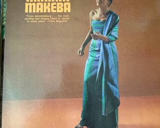 Includes a collection of vintage vinyl records from the 1960s and 1970s, featuring genres such as folk, world music, and educational records. Notable titles include 'Modern Spanish,' 'Hilo Hawaiians Honeymoon in Hawai'i,' and 'Here's Tae Bonnie.' See pictures for more details.