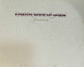 Vinyl Record Lot featuring 'Bad Company' and Earth Wind & Fire albums. See pictures for more details.