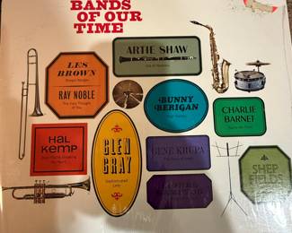 Vintage vinyl record collection featuring artists like Spinners, Duke Ellington, Glenn Miller, and others. Includes titles such as 'Used to Be Duke,' 'The Roaring 20's,' 'Coffee Break,' and 'Dream Dancing.' See pictures for more details.