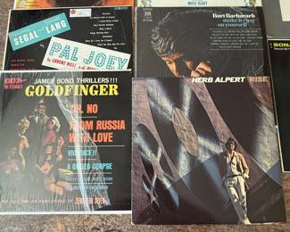 Vinyl Record Collection featuring albums from Tchaikovsky, Kentonality, Great Songs of Christmas, Talk Talk, and more. See pictures for details.
James Bond Goldfinger and other greatest hits