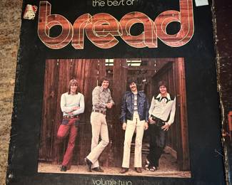 Lot of vintage vinyl records including 'The Best of Bread', Harry Chapin's 'Portrait Gallery', and albums by the Allman Brothers Band, Dean Baez, and others. Diverse selection for collectors and music enthusiasts.
Please check photos for condition and any condition issues. We have verified the contents and looked for major scratches. This is a well loved collection and should be accepted as such.