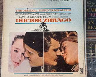 Vintage Vinyl Record Lot featuring classic soundtracks from notable movies and musicals, including 'South Pacific,' 'West Side Story,' 'The Pajama Game,' ‘Dr. Zhivago’ ‘An Affair to Remember,’ ,Swan Lake’ and more. See pictures for details.