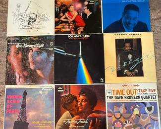 Vinyl Record Album collection featuring classic jazz albums from the Dave Brubeck Quartet, Duke Ellington, George Benson, and more. Includes titles like 'Count Basie', 'One Stormy Night', and 'Under Skies of Paris'. Perfect for collectors and jazz enthusiasts.
