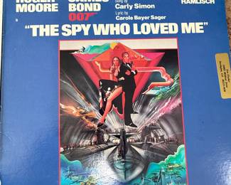 Vinyl Record Collection featuring titles such as 'My Fair Lady', 'The Spy Who Loved me' 'Doctor Zhivago', 'South Pacific', and 'For Your Eyes Only'. Includes various artists and soundtracks. Year and brands may vary. See pictures for more details.