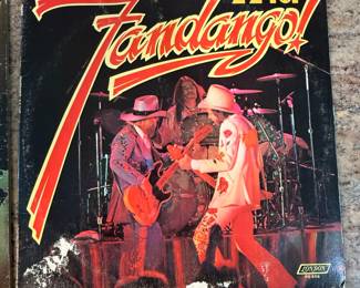 Vintage Vinyl Record Lot including 'Led Zeppelin III' (1970), 'The Best of ZZ Top' (1978), 'Rare Earth' (1971), and 'Fandango!' by ZZ Top (1975). See pictures for more details.