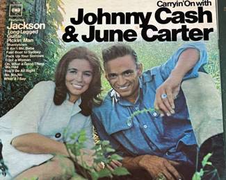 Vintage Vinyl Record Collection featuring iconic albums from the 1970s, including works by Elvis Presley, Johnny Cash, June Carter, Harry Chapin, and Michael Murphey. Merle Haggard and Willie Nelson when they were young aspiring artists! A must-have for collectors and music enthusiasts.