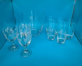 Mignon Faget Fleur De Lis Entertaining Set. Ice Bucket, Water Goblets and High Ball Glasses Kappa Kappa Gamma. This is a beautiful etched glass collection by Mignon Faget featuring a signature Fleur De Lis symbol. The collection includes a large ice bucket, an Ice Scoop, three water goblets and five high ball glasses.