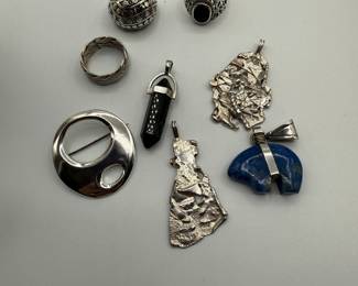 Eclectic Collection of pendants, Rings and pins.