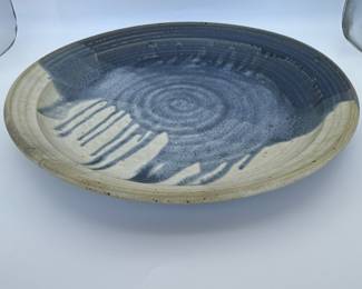 Handcrafted Ceramic Plate - Unique Artistry.