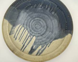 Handcrafted Ceramic Plate - Unique Artistry.