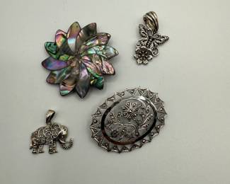 Collection of four pendants/pins - Sterling Silver