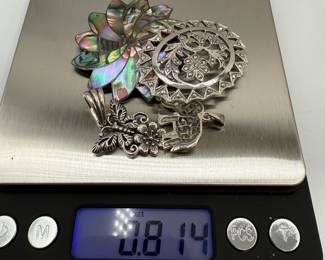 Collection of four pendants/pins - Sterling Silver