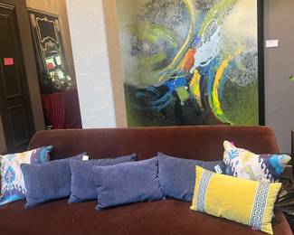 Brown velvet sofa and very large, beautiful painting. Blue pillows are from pier one