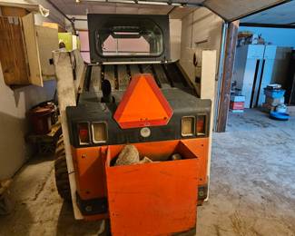 Weighted box on back of Bobcat 863