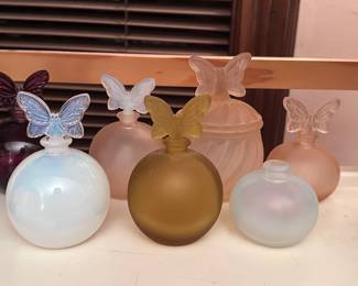 Assortment of butterfly perfume bottles