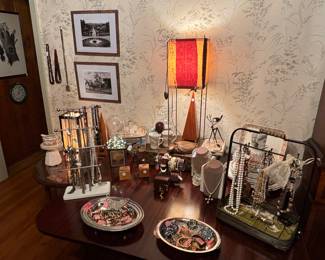 This was my last staging table!! In the dining room. That's a Mid Century Box Kite lamp... Carved turtle at the base is an Earnest Hand sculpture. Florida fella