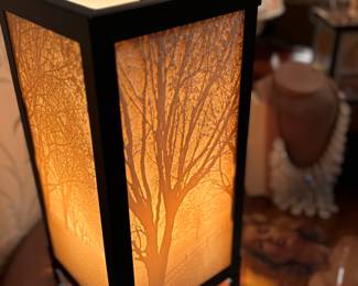 Nature comes indoors with this ethereal side lamp