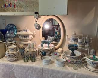 OK! We have two sets of dishes and we all know how we feel about dishes at a sale, but these are real fine blue and white and you can break it up into sets of 2, 4, 6 or whatever…