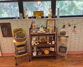 More stuff has been added to this yellow display, namely, Lala, the Teletubby gal! I like walking by this room and punching her in the stomach so she giggles and make some weird noises :-) I’ll switch the photo out soon with her in it