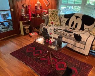 Mickey!! This is an old Disneyland blanket very well kept. A couple of these smaller Persian rugs are around the house. I like the small size