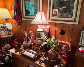 These children need a home! Fantastic frames… These kids go back a few generations in the family here. Oh, and wondering if anybody can guess what that plaid metal thing is on the table;) Super old copper pieces and a GREAT pair of vintage Red Wing boots. If they were my size, you would not be seeing them in this display…