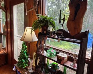 Another soothing color that we take for granted… Gorgeous green.. that is a beautiful hand, finished piece of wood on a stand on the top shelf
