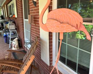 If we’ve seen one flamingo we’ve seen a dozen. Nice wooden planter…