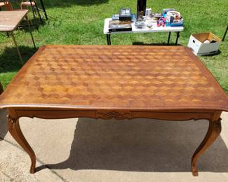 French provincial  inlayed table with extensions.