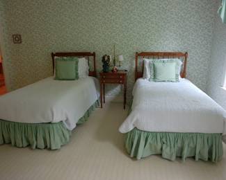 Twin Beds With Pillows and Bedskirts